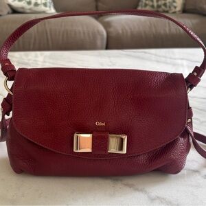 Chloe Lily Dark Red Leather Crossbody Bag with Gold Bow Accent